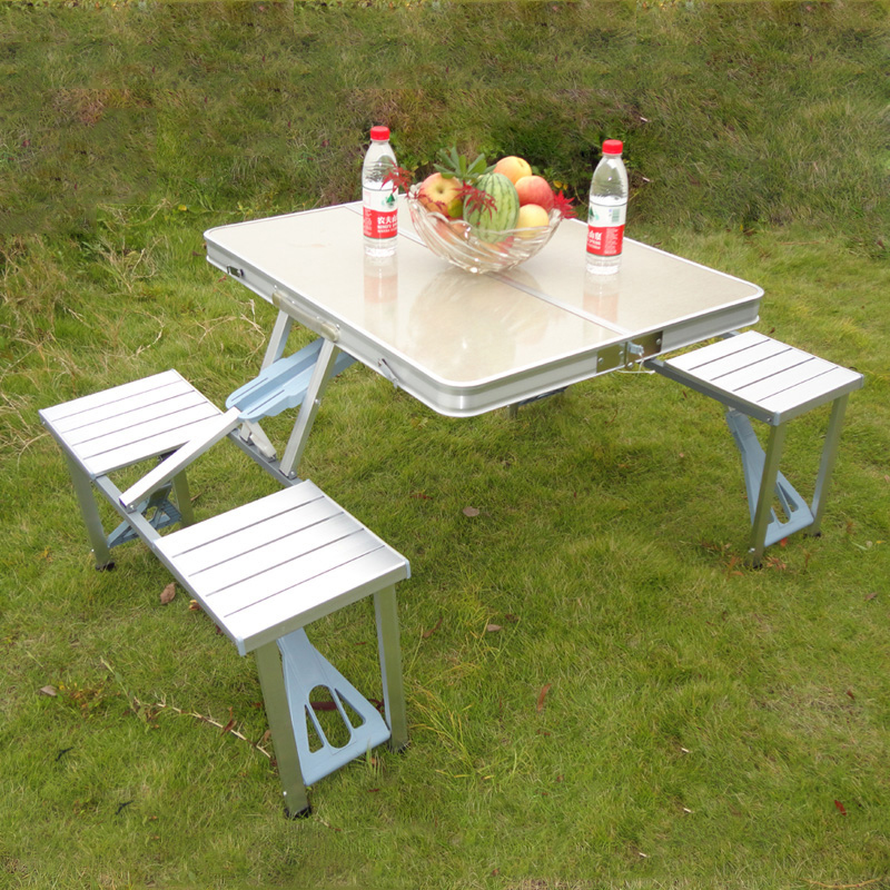 Folding picnic table and four chairs